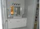 Bathroom vanity with mirror and sink, featuring ample storage space at 833 N 700 W, Greenfield, IN 46140