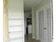 Open entryway with white shelving and French doors leading to additional rooms at 833 N 700 W, Greenfield, IN 46140