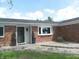 Inviting front entrance to a brick home with manicured landscaping at 833 N 700 W, Greenfield, IN 46140