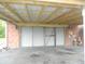 Garage with door, providing secure parking and storage at 833 N 700 W, Greenfield, IN 46140