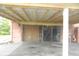 Attached garage with a door, offering covered parking and storage at 833 N 700 W, Greenfield, IN 46140