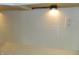 Close-up of kitchen backsplash with textured tile and under-cabinet lighting at 833 N 700 W, Greenfield, IN 46140