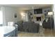 Inviting living room featuring a cozy fireplace, built-in shelves, hardwood floors and a ceiling fan at 833 N 700 W, Greenfield, IN 46140