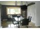 Cozy living room featuring a bay window, stylish lighting, and comfortable seating at 833 N 700 W, Greenfield, IN 46140