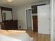 Main bedroom boasts ample closet space and traditional-style dressers with great natural light at 833 N 700 W, Greenfield, IN 46140