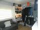 Walk-in closet provides ample storage with custom shelving and convenient seating area for organizing belongings at 833 N 700 W, Greenfield, IN 46140