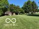 Well-maintained backyard featuring a storage shed and plenty of green space at 8835 Winding Ridge Rd, Indianapolis, IN 46217