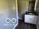 Updated bathroom featuring a sleek glass shower and modern vanity at 8835 Winding Ridge Rd, Indianapolis, IN 46217
