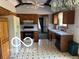 Well-equipped kitchen featuring classic cabinetry and ample counter space at 8835 Winding Ridge Rd, Indianapolis, IN 46217