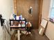Functional home office area with a built-in desk, storage shelves, and natural light from the window, ideal for productivity at 909 Sullivan St, Alexandria, IN 46001