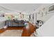 Inviting living room with hardwood floors, a fireplace, and plenty of natural light at 10172 Watkins Ct, Indianapolis, IN 46234