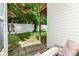 A patio with a view of a white fence and green trees at 1030 Longwell Pl, Indianapolis, IN 46240