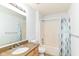 A full bathroom featuring a vanity with granite counters and tub at 1030 Longwell Pl, Indianapolis, IN 46240