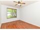 Bedroom featuring light hardwood floors, natural lighting from the window and neutral walls at 1030 Longwell Pl, Indianapolis, IN 46240