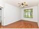 An empty bedroom featuring wood-look floors and a bright window at 1030 Longwell Pl, Indianapolis, IN 46240