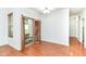 Well-lit dining room with laminate flooring and elegant shutters leading to outdoor seating at 1030 Longwell Pl, Indianapolis, IN 46240