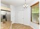 Kitchen with stainless steel refrigerator, tile flooring and granite counters at 1030 Longwell Pl, Indianapolis, IN 46240