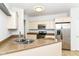 Kitchen boasts stainless appliances, granite countertops and ample cabinet space for storage solutions at 1030 Longwell Pl, Indianapolis, IN 46240