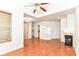Bright and airy living room boasting hardwood floors, built-in shelves, and a fireplace at 1030 Longwell Pl, Indianapolis, IN 46240