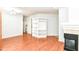 Open living room featuring a fireplace and built-in shelving for plenty of storage and stylish accents at 1030 Longwell Pl, Indianapolis, IN 46240