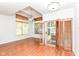 Open living area with vaulted ceilings, a ceiling fan, and sliding doors to an outdoor space at 1030 Longwell Pl, Indianapolis, IN 46240