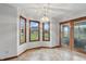 Dining area with bay window, light fixture and tile flooring at 105 Meadowview Ln, Greenwood, IN 46142