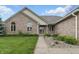 Inviting front entrance featuring a walkway, meticulous landscaping, and a cozy porch area at 105 Meadowview Ln, Greenwood, IN 46142