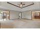 Open-concept living room featuring neutral decor and seamless flow to adjacent spaces at 105 Meadowview Ln, Greenwood, IN 46142