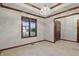 Bright and airy room with a chandelier, window views, and tasteful trim detail at 105 Meadowview Ln, Greenwood, IN 46142