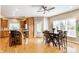 Eat-in kitchen with hardwood floors, stainless appliances, and access to the backyard at 10784 Giselle Way, Fishers, IN 46040