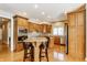 Bright kitchen featuring an island with a granite countertop and seating for two at 10784 Giselle Way, Fishers, IN 46040