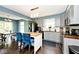 Beautiful kitchen features stylish gray cabinetry, stainless steel appliances, and a butcher block island at 10876 Trailwood Dr, Fishers, IN 46038