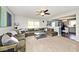 Bright and airy living room showcasing an open layout and comfortable furnishings at 10876 Trailwood Dr, Fishers, IN 46038
