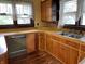 A bright kitchen showcasing ample cabinetry, double windows, and a functional layout at 121 W Fordice St, Lebanon, IN 46052