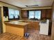 Spacious kitchen with wood cabinets and white appliances at 121 W Fordice St, Lebanon, IN 46052