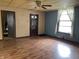 A spacious living room featuring laminate floors, light walls and an abundance of natural light at 121 W Fordice St, Lebanon, IN 46052