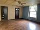 A spacious living room featuring laminate floors, light walls and an abundance of natural light at 121 W Fordice St, Lebanon, IN 46052