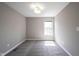 Neutral bedroom features gray carpet, a window with natural light, and ample space at 12600 Misty Ridge Ct, Fishers, IN 46037