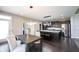 This modern kitchen has an island, stainless steel appliances and dining table at 12600 Misty Ridge Ct, Fishers, IN 46037