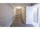 Walk-in closet featuring white shelving and neutral walls and carpet at 12600 Misty Ridge Ct, Fishers, IN 46037