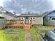 Charming backyard with a wooden deck and garden area, ideal for outdoor living at 1332 W 26Th St, Indianapolis, IN 46208
