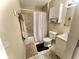 Well-maintained bathroom featuring a shower-tub combo and classic fixtures at 1332 W 26Th St, Indianapolis, IN 46208
