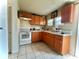 Functional kitchen with ample counter space, great for meal preparation and storage at 1332 W 26Th St, Indianapolis, IN 46208