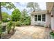 Relaxing outdoor patio area with seating, surrounded by lush greenery and a serene atmosphere at 140 Meridian Hills Blvd, Indianapolis, IN 46260