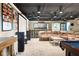 Spacious basement with a home theater, bar area, and comfortable seating for entertainment at 140 Meridian Hills Blvd, Indianapolis, IN 46260