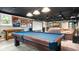 Entertaining basement with a pool table and home theater, perfect for fun and relaxation at 140 Meridian Hills Blvd, Indianapolis, IN 46260