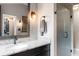 Bathroom featuring granite counters, modern fixtures, and a glass walk-in shower at 140 Meridian Hills Blvd, Indianapolis, IN 46260