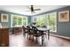 Dining room with natural light flooding through large windows overlooking foliage at 140 Meridian Hills Blvd, Indianapolis, IN 46260