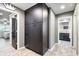 Hallway with built-in storage cabinets and views to the bedroom and bathroom at 140 Meridian Hills Blvd, Indianapolis, IN 46260