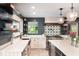 Stylish kitchen with open shelving, stainless steel appliances, and quartz countertops at 140 Meridian Hills Blvd, Indianapolis, IN 46260